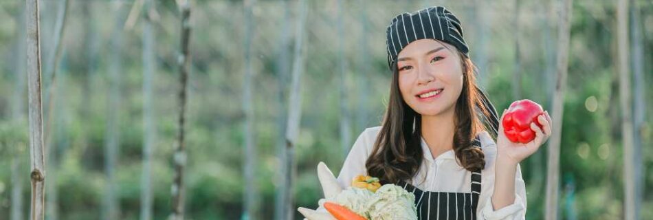 Young female farmer producing foods