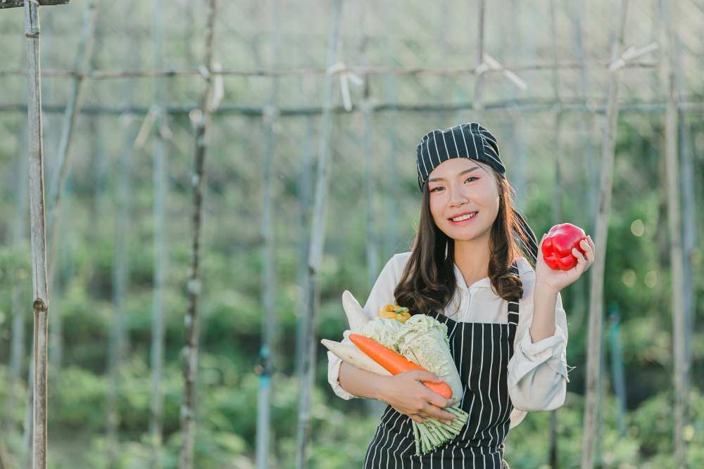 Young female farmer producing foods